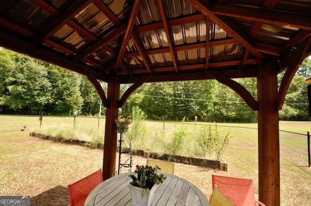 exterior space with a gazebo and fence