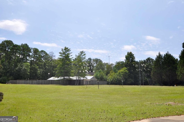 view of yard with fence