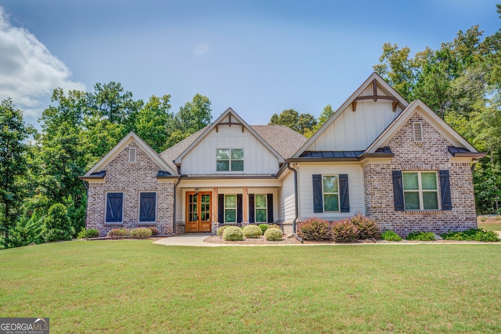 craftsman-style home with a front yard