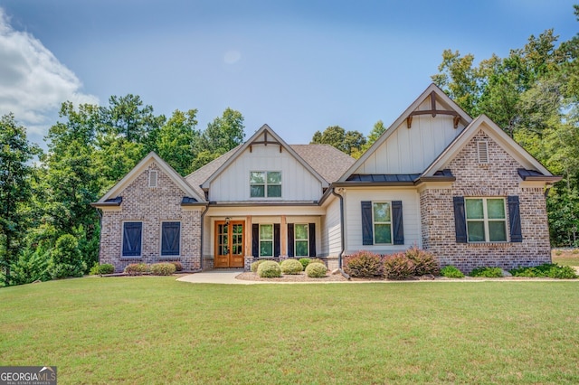 craftsman-style home with a front yard