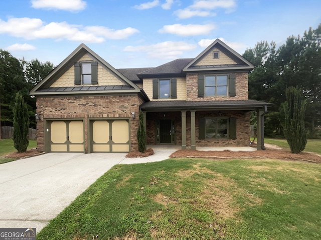 view of front of house with a garage, driveway, brick siding, and a front yard