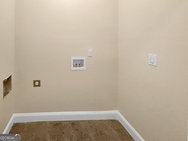 laundry area featuring baseboards, laundry area, washer hookup, and hookup for an electric dryer