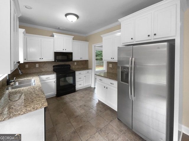 kitchen featuring ornamental molding, a sink, black appliances, white cabinetry, and backsplash