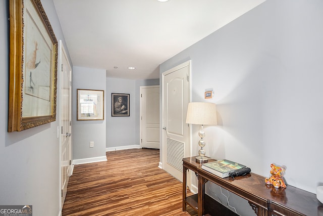 hallway featuring hardwood / wood-style floors