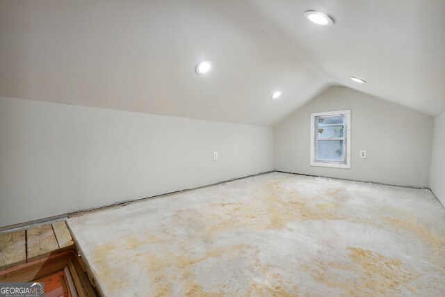 bonus room featuring vaulted ceiling