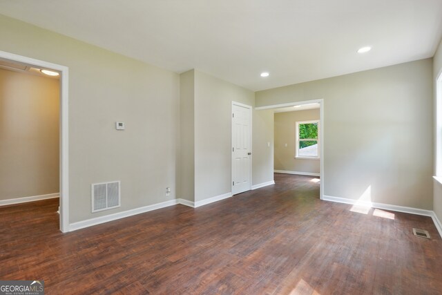 unfurnished room featuring hardwood / wood-style floors