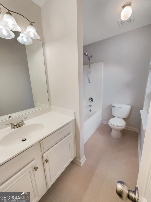 bathroom with visible vents, toilet, tub / shower combination, vanity, and baseboards