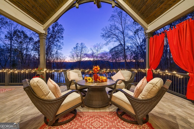 view of patio terrace at dusk