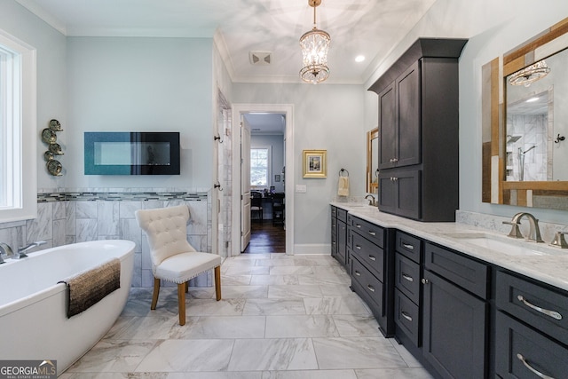 bathroom with a notable chandelier, tile walls, a bath, ornamental molding, and vanity