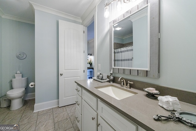 bathroom with toilet, vanity, crown molding, and curtained shower