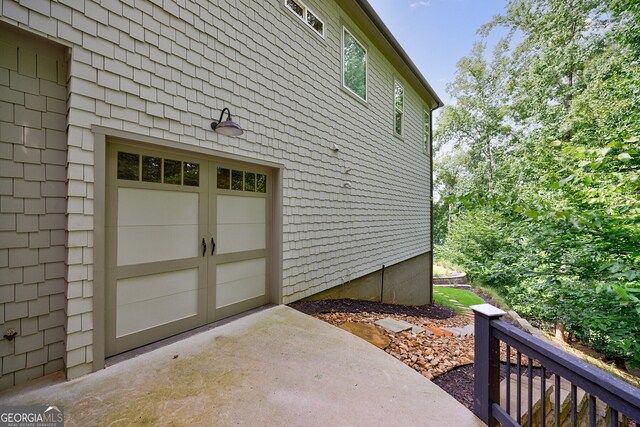 exterior space with a garage