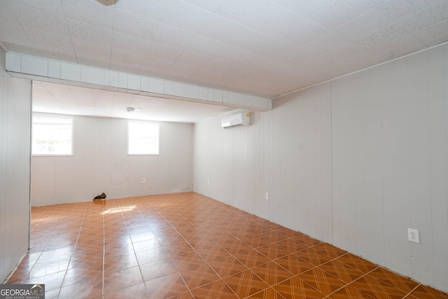 basement featuring a wall mounted AC