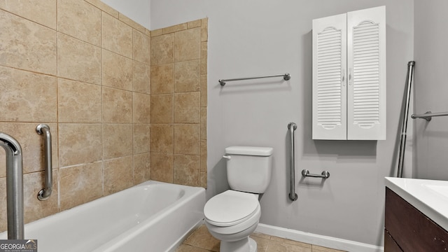 full bathroom featuring toilet, vanity, tile patterned floors, and tiled shower / bath combo