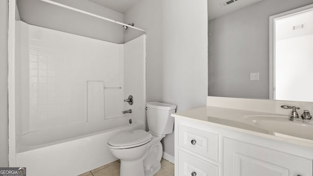 full bathroom featuring tile patterned flooring, vanity, toilet, and tub / shower combination