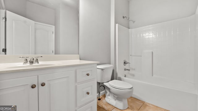 full bathroom featuring toilet, shower / tub combination, vanity, and tile patterned floors