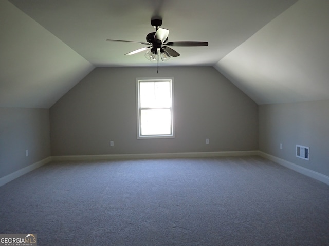 bonus room with ceiling fan, carpet flooring, and lofted ceiling