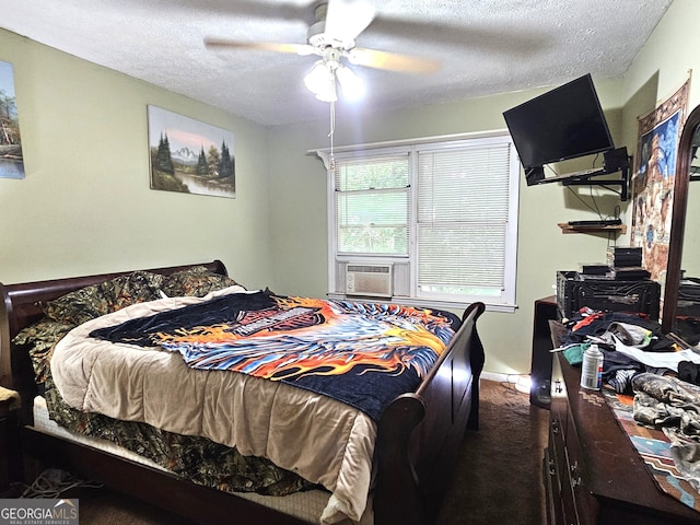 carpeted bedroom featuring ceiling fan, a textured ceiling, and cooling unit