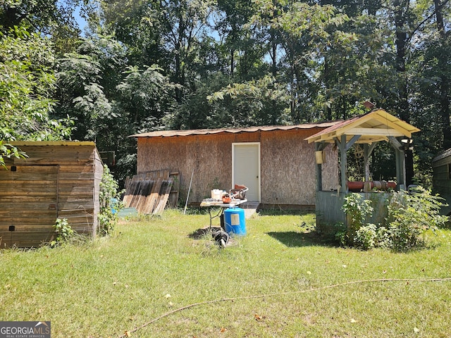 exterior space featuring a shed