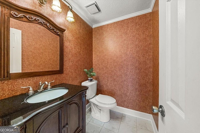 half bath featuring vanity, toilet, crown molding, visible vents, and a textured ceiling