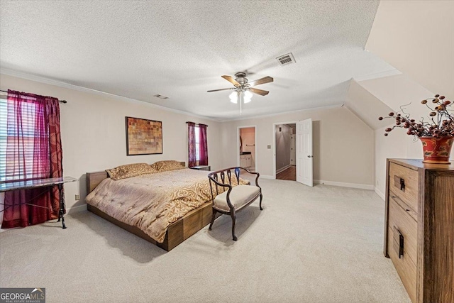 bedroom featuring baseboards, visible vents, and light colored carpet