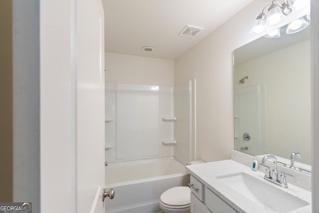 full bathroom with vanity, shower / bath combination, and toilet