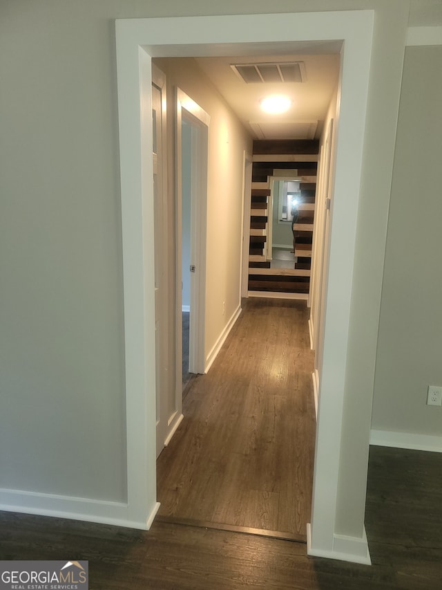 hall featuring dark hardwood / wood-style flooring