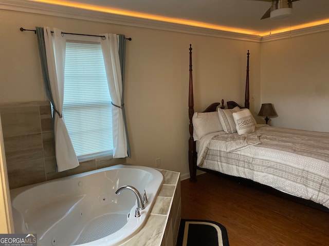 bedroom featuring ceiling fan and dark hardwood / wood-style floors