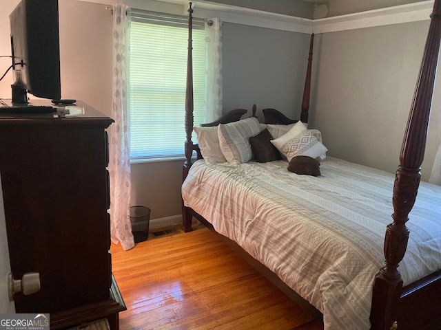 bedroom featuring light hardwood / wood-style floors