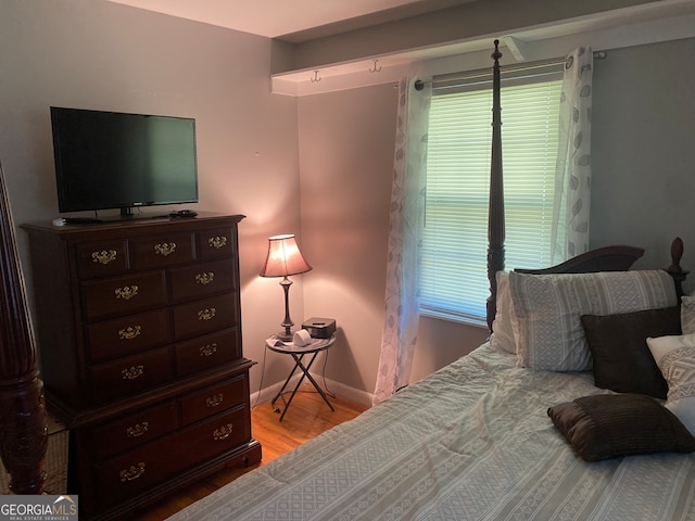 bedroom with light hardwood / wood-style floors