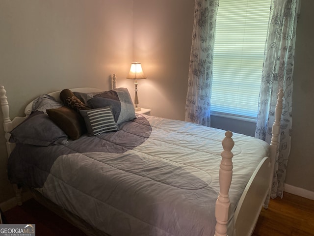 bedroom featuring hardwood / wood-style flooring