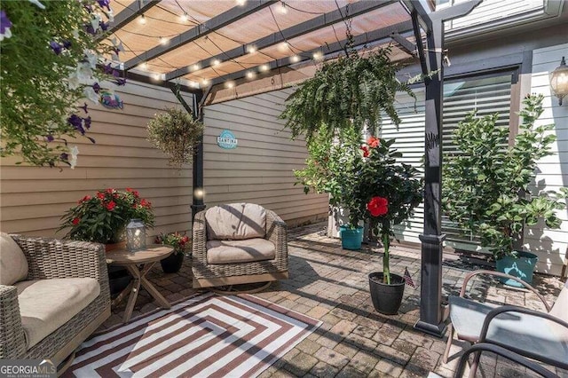 view of patio / terrace featuring a pergola