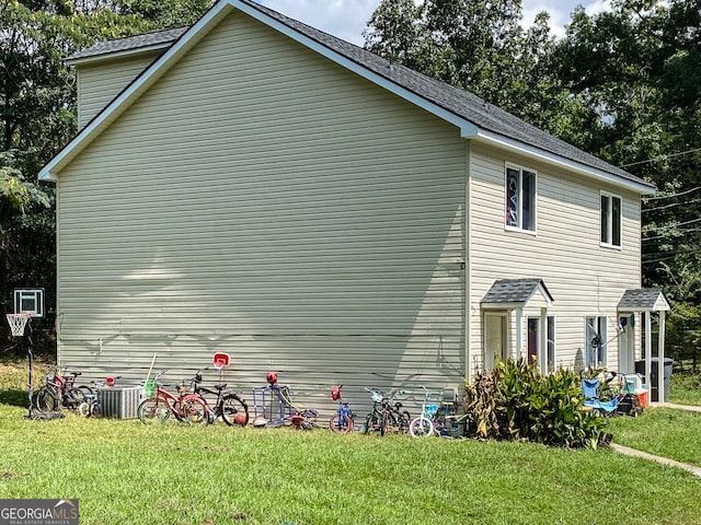 view of property exterior featuring a yard