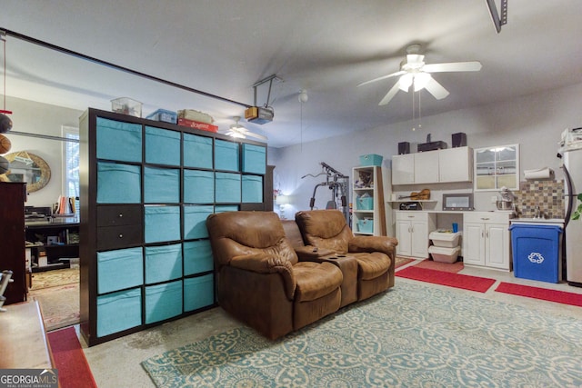 interior space with ceiling fan