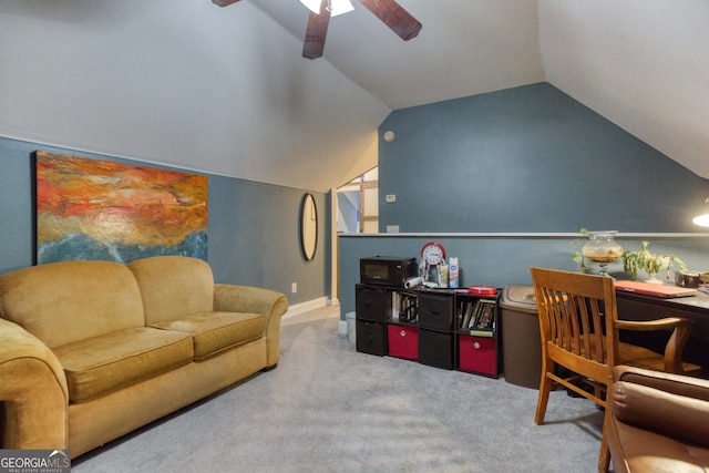 living room with lofted ceiling, ceiling fan, and carpet floors