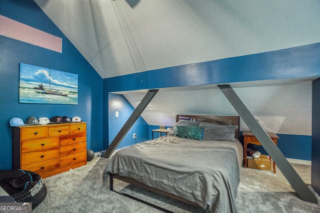 carpeted bedroom featuring lofted ceiling