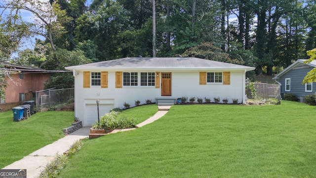 ranch-style house with a front lawn and a garage