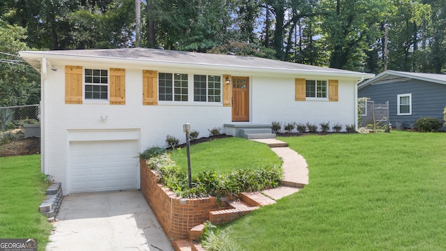 ranch-style house with a garage and a front yard