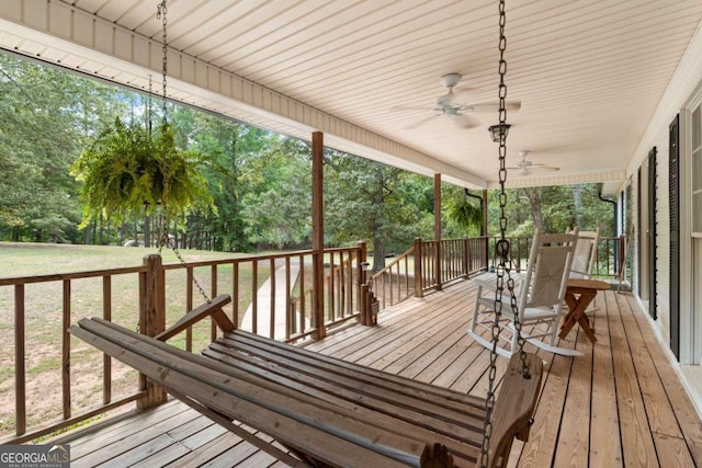 wooden terrace with ceiling fan