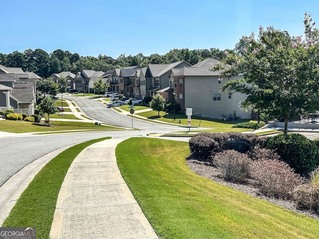 view of community featuring a lawn