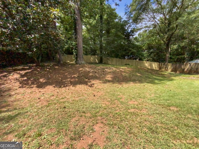 view of yard featuring fence