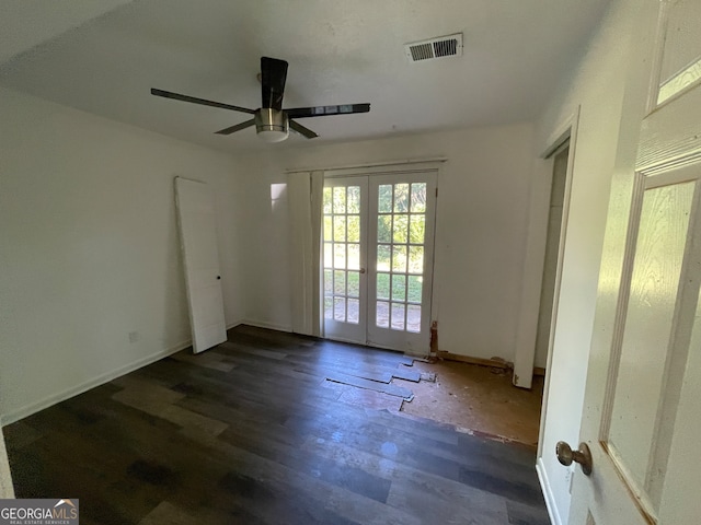 unfurnished room with ceiling fan, french doors, and hardwood / wood-style floors