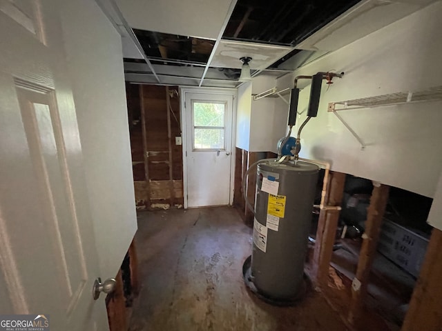 basement featuring electric water heater