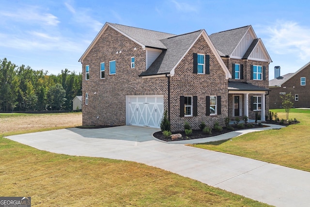 view of front facade featuring a garage, a front yard, concrete driveway, and brick siding