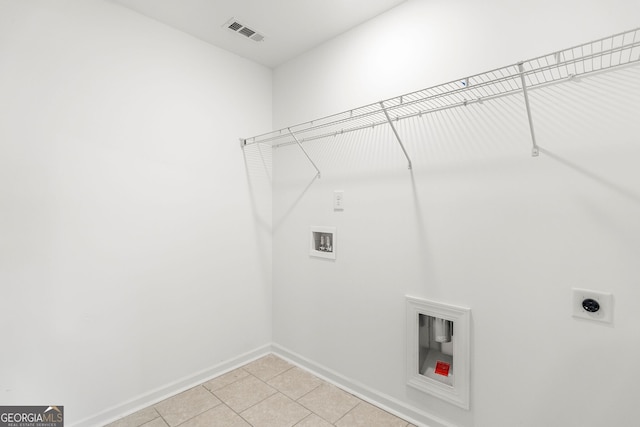 laundry area featuring laundry area, baseboards, visible vents, hookup for a washing machine, and hookup for an electric dryer