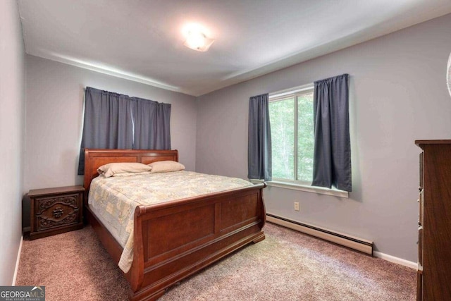 bedroom featuring baseboards, carpet flooring, and baseboard heating