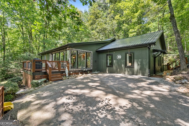 view of front of property with a deck