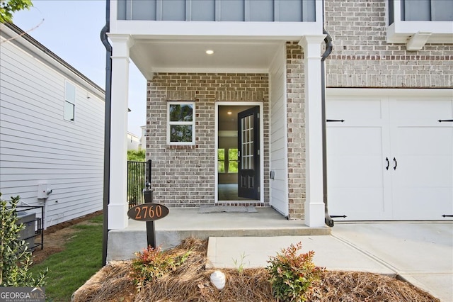 entrance to property featuring a garage