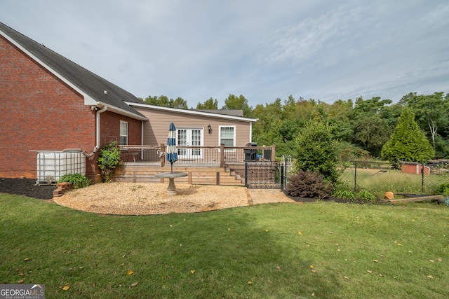 view of yard with a wooden deck