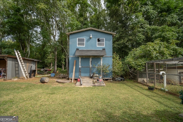 view of outdoor structure with a lawn