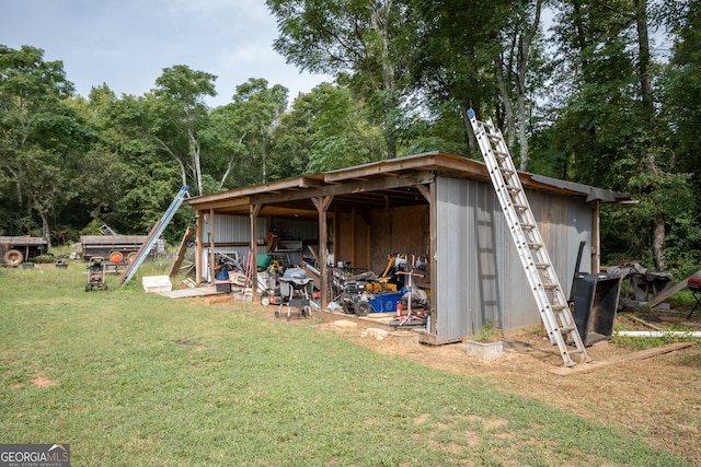 view of outdoor structure with a yard